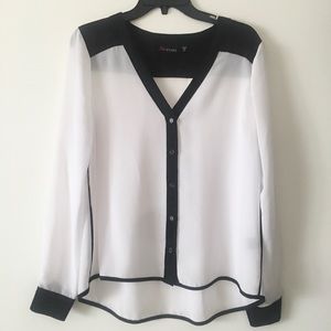 White buttoned up blouse